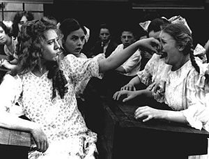 Physical bullying at school, as depicted in th... Physical bullying at school, as depicted in th...